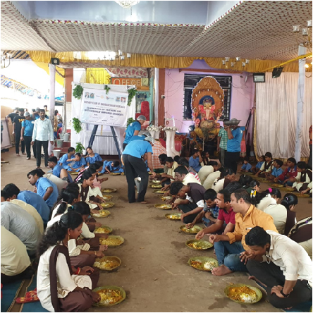 Cooked food served to visually impaired students and their teachers on Annapurna Day.
